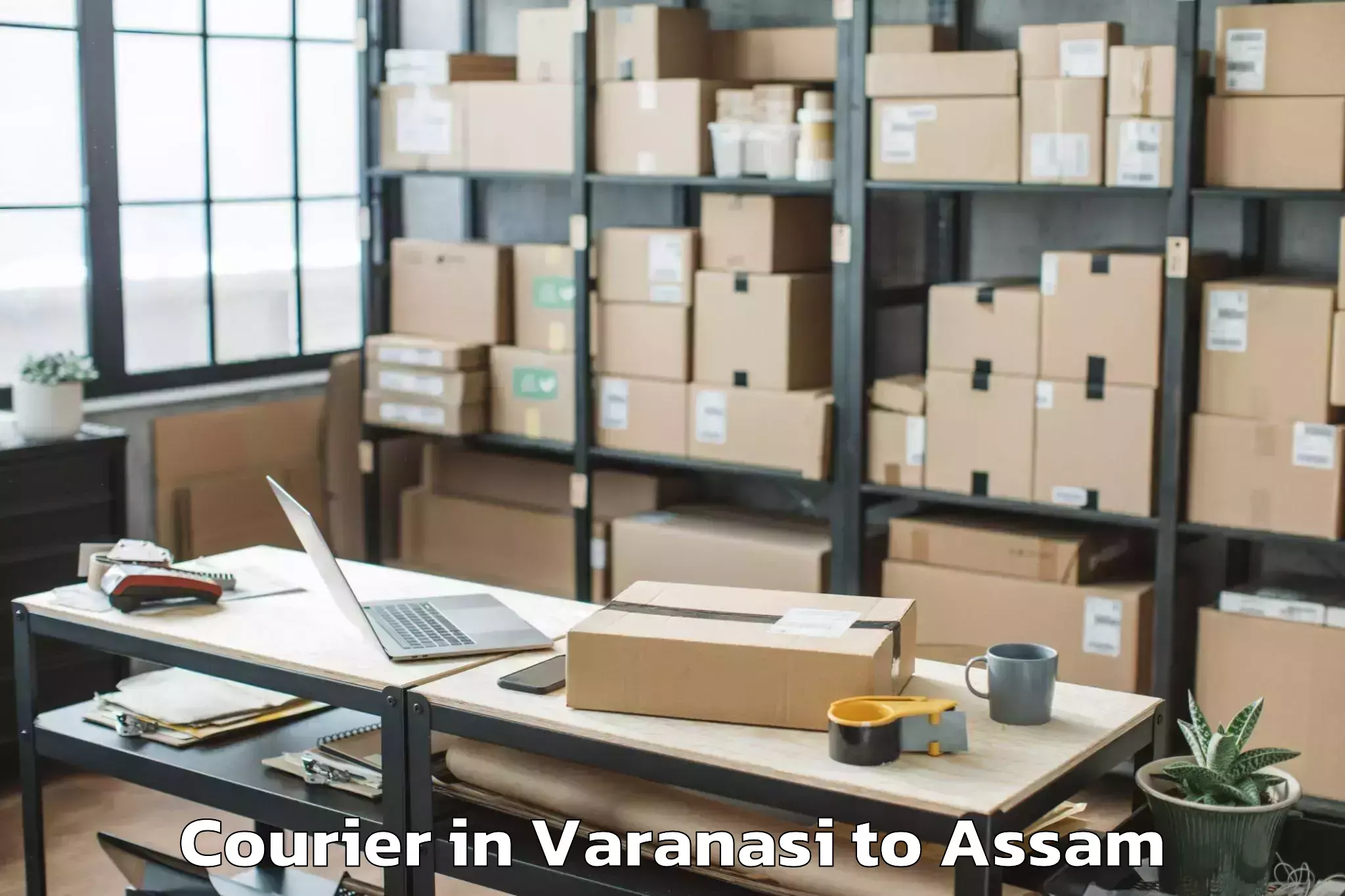 Varanasi to Demow Courier Booking